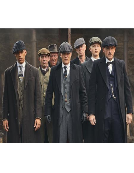 Peaky Blinders series main characters led by Thomas Shelby all wearing suits, peakies, and overcoats 